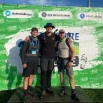 Supporters x 3 posing for picture at ultra challenge event