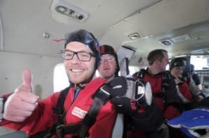 Supporters inside plane for fundraising sky dive