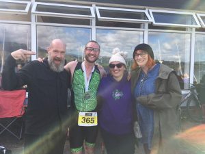 People celebrate completing triathlon