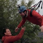 Person on zip line fundraiser